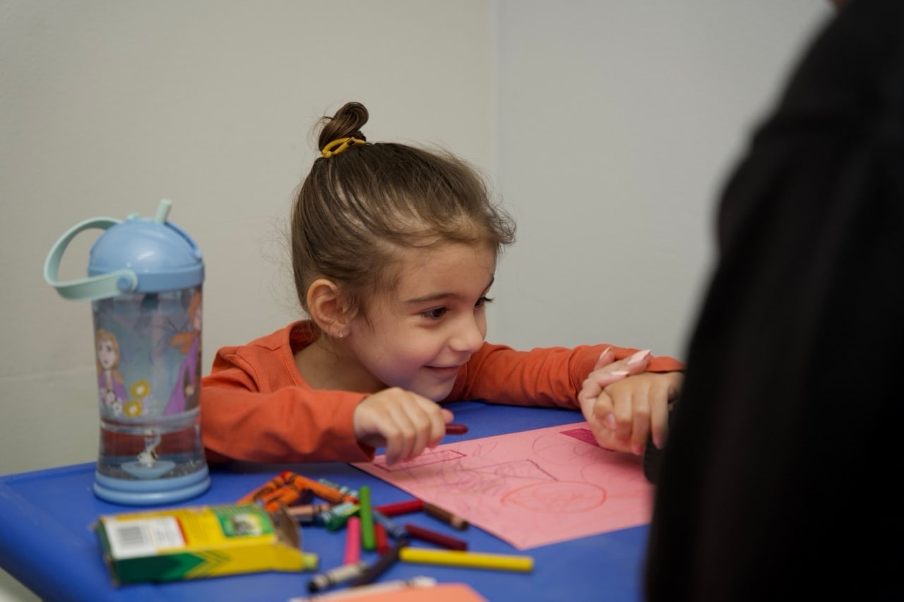 ABA therapist working with a child